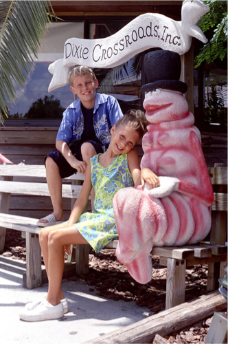 Kids Posing with shrimp statue
